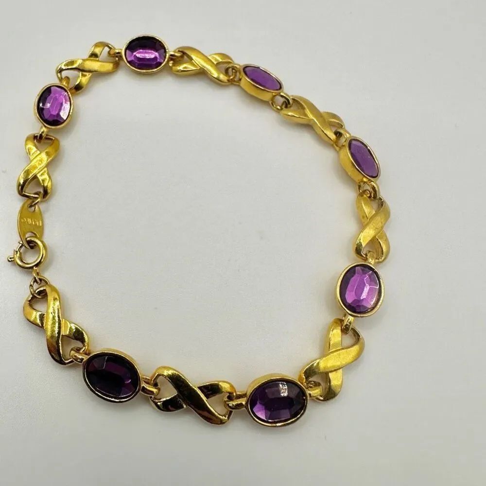 Avon gold tone x purple vintage bracelet